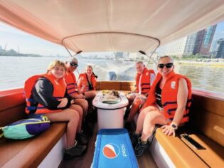 Visitors on speedboat tour in Saigon River